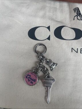 Coach Silver-Tone Keychain with Pink 'Peach' Round Charm